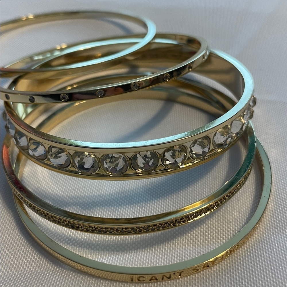 Elegant Gold and Silver Bangle Set - I can’t say I do without you on them